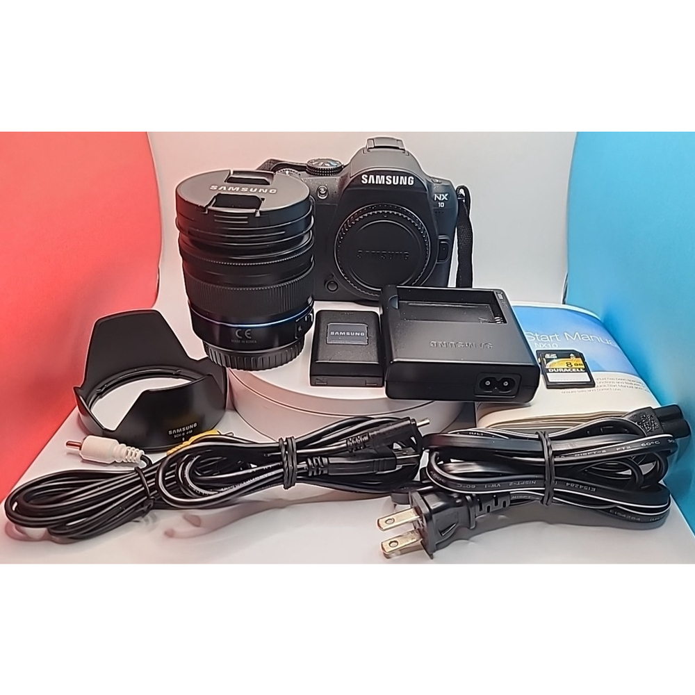 Samsung NX10 Camera 14.6MP With 18-55mm Lens, Hood Shade, SD Card, Cables Etc.